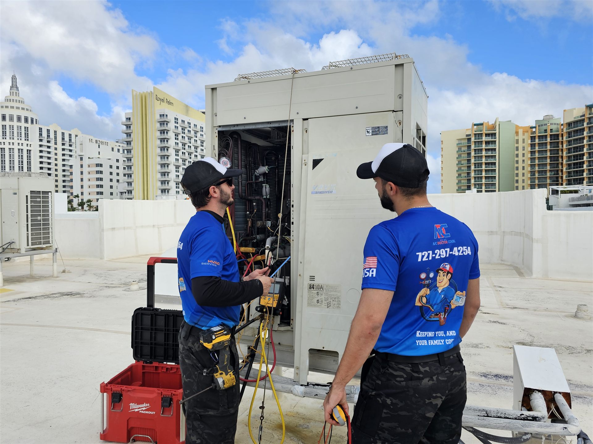 ACDR technicians performing emergency diagnostics on rooftop equipment
